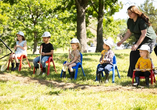 Children from the daycare particpate in the ground breaking
